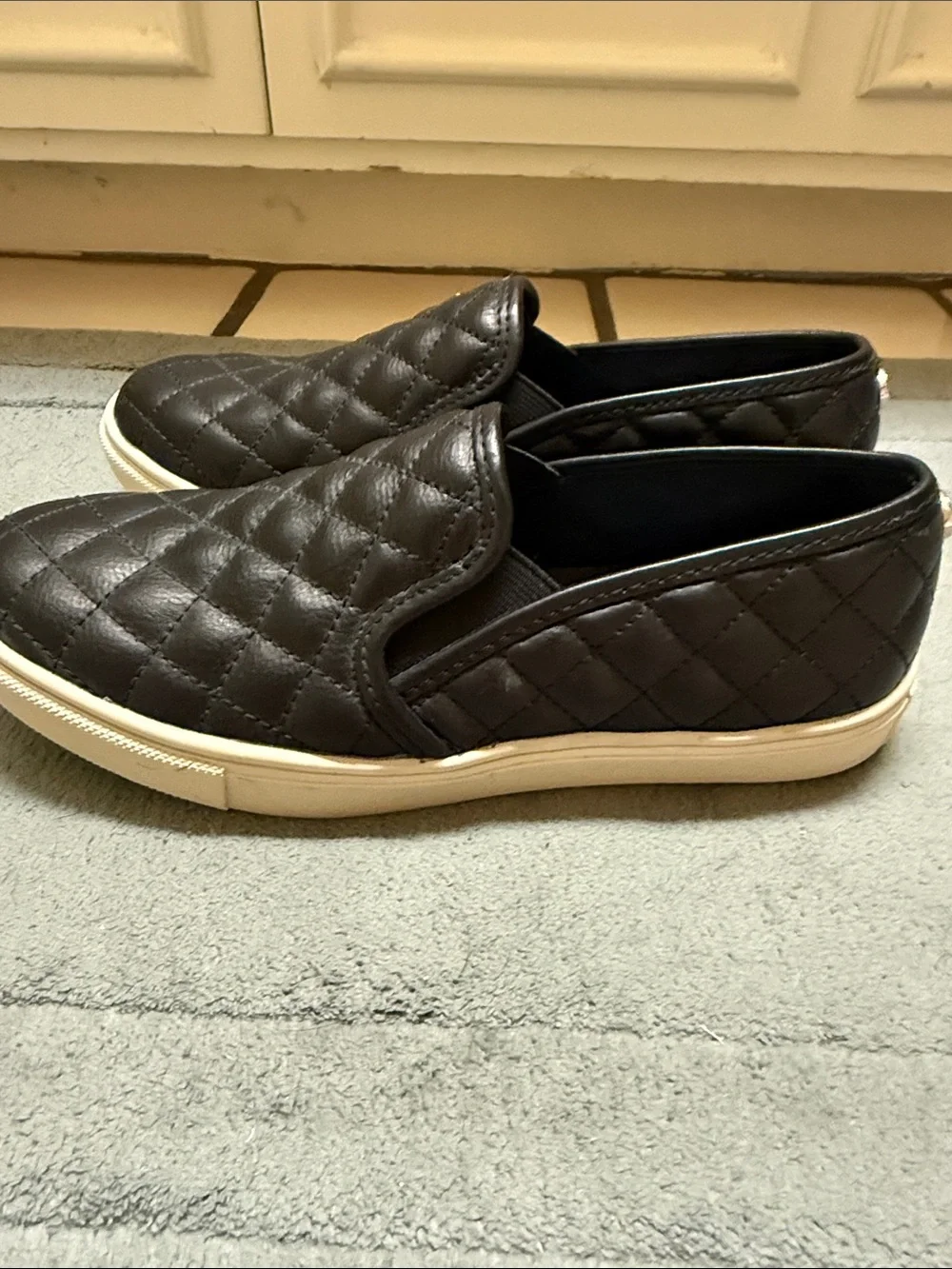 Steve Madden Black Quilted Slip-On Sneakers with White Sole